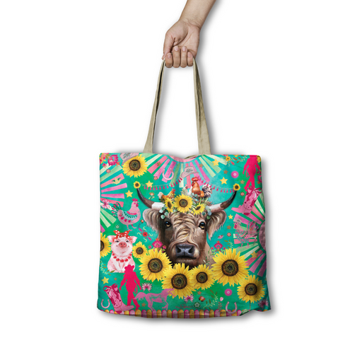 Lisa Pollock Carnival Cow Tote Bag (RSB105) with a Highland Cow, pig, chickens, sunflowers, and farm festival themed art on a green background.